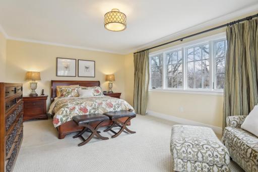 Owner's suite with updated full bathroom and walk in closets.
