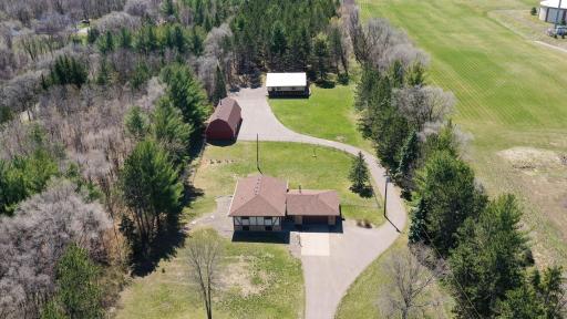 Welcome home! This is the one you have been waiting for! Private almost 5 Acre estate-like setting with wildlife abound!