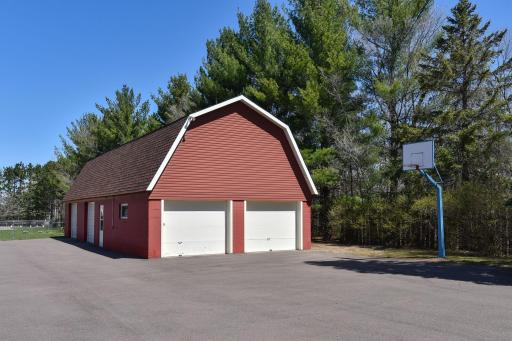 Additional heated & air conditioned large detached garage with car lift, air compressor with loft above!
