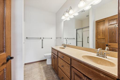 Primary bathroom with shower and double sink