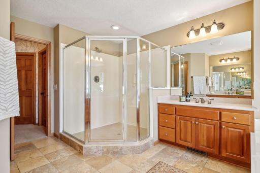 Step inside to this oversized shower, ceramic tiled floors