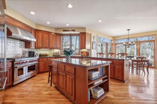 Dream kitchen includes a center island, HWD floors, granite countertops