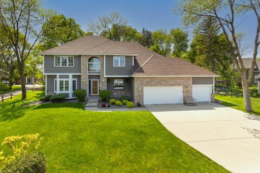 Impeccable home perfectly situated on a beautiful 0.42-acre cul-de-sac lot with no detail overlooked in prestigious W. Bloomington