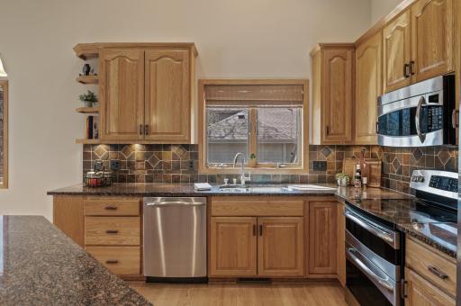 Granite counters and ample cabinet space.