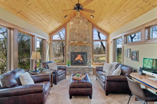 Check out this stunning porch with stone surround fireplace and amazing views! Relax and enjoy!