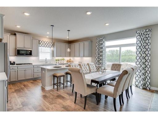 One of the first things you'll notice is our attention to detail throughout the layout, especially here in the kitchen! Photo of model home, color and options will vary.
