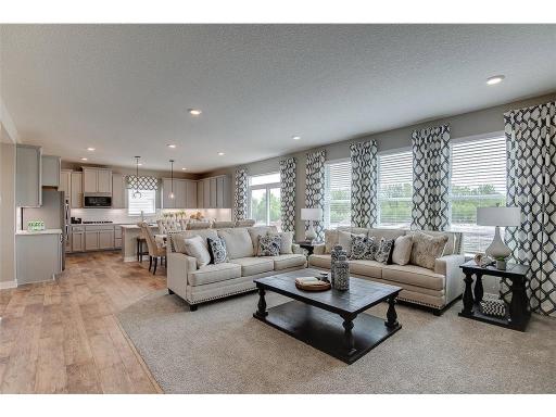 A second view of the main level family room. Imagine the possibilities!! Photo of model home, color and options will vary.