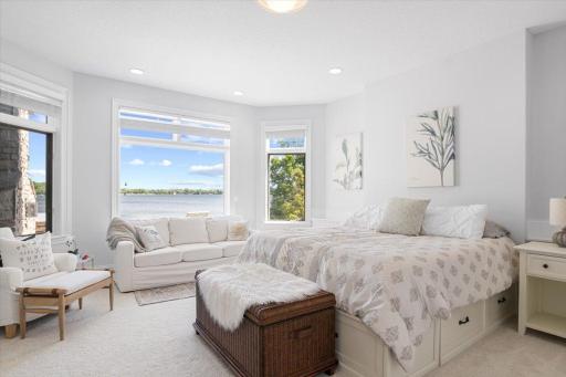 The 2nd primary bedroom has its own unique charm. Offering a private area to rest and relax. With its own one-of-a-kind lake view.