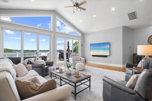 Large, vaulted ceilings, and expansive windows allow natural light in.