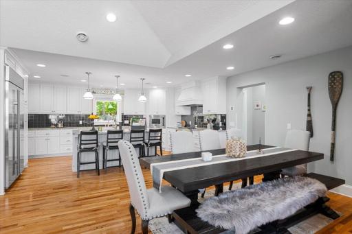 Open area, connecting the dining room and kitchen. Walk in pantry around the corner.