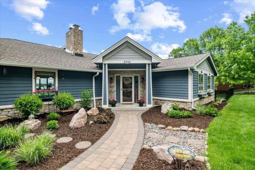 Before you enter the home, enjoy the smell of fresh mulch and flowers. Stone paths with meticulously maintained landscaping. Lawn is professionally maintained.