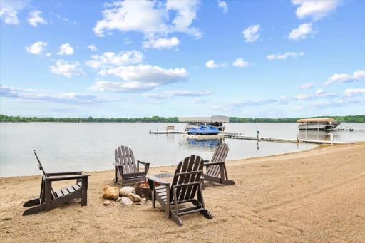 After a long day of boating around Cedar Lake, enjoy the fire around the beach firepit.