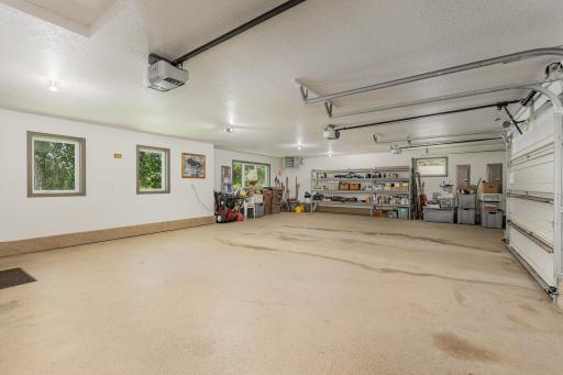 The garage is insulated, heated and fully finished. It also features: a custom garage fridge (available for purchase), a utility sink with: 2 tubs & overhead storage cabinets, an epoxied floor, and 6 windows for plenty of natural light.