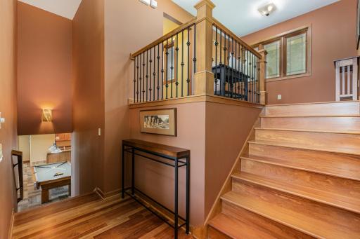 Looking down at the family room (in the north wing of the residence), from the bottom of the foyer stairs.
