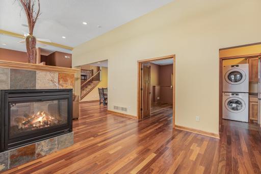 Beyond the sitting room is the 2nd bedroom/office, the linen closet, laundry room and 1/2 bathroom.