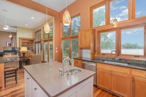 This kitchen offers a convenient appliance garage above the Kenmore Elite, stainless steel dishwasher. You won't mind doing dishes by hand either - especially with your view of the lake.