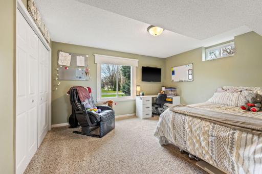 4th bedroom in lower level with large daylight window and sizable closets.
