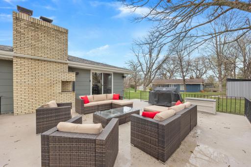 Incredible patio offers over 500sqft of outdoor entertaining space. This 23 x 22 patio is located just off the kitchen/dining room and includes a built-in outdoor fireplace.
