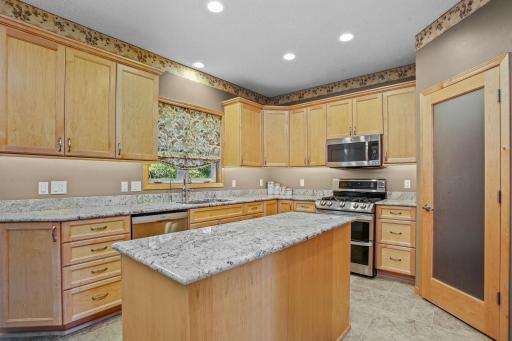 Professionally Remodeled with Custom Maple Cabinetry