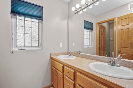 Full Upper-Level Bathroom with Double Sinks