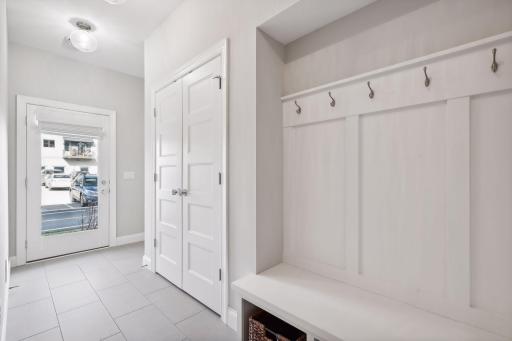 Just off the garage on the main level is a convenient Mud Room that features a built-in bench with shoe cubbies and coat hooks. The back door leads to your main level Patio.