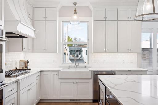 Beveled subway tile and designer finishes elevate the style and sophistication of the Kitchen while creating a bright and open space that is perfect for testing out new recipes.