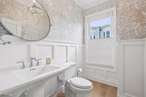The Powder Room offers board and batten detailing and new designer wallpaper.