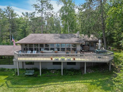Welcome to this unique & wonderful lake home on the shore of Bass Lake located just a few miles north of Outing MN.