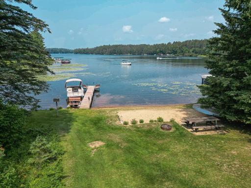 Fantastic view from the deck! Large sandy area at the shoreline ideal for waterfront recreation!