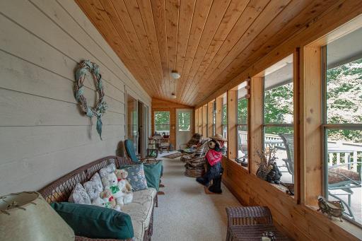 Off this porch you will find a 46x10 plus 17x14 deck to further enjoy the great outdoors and the lake activity!