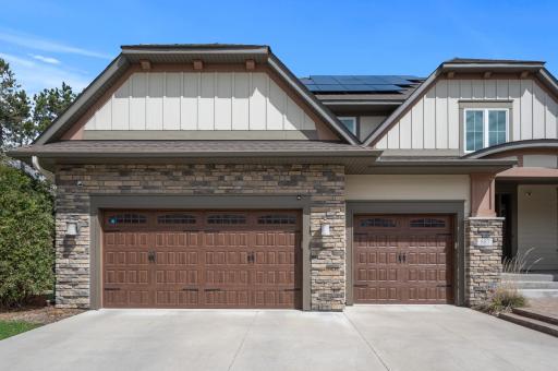 Behind these beautiful garage doors lies a space for functional organization and absolute utility
