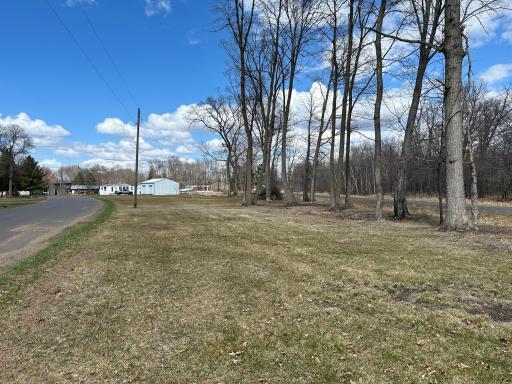 Looking down the road toward the home/garage/pole shed - a great big lot with plenty of space and privacy!