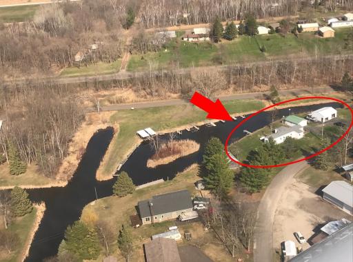 Another aerial view of the property highlighting the harbor where owner has dock on one side but also owns on other side of harbor as well! The launch access on other side of harbor is available to all owners in the harbor!
