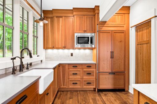 Specious walk-in Pantry next to built-in Refrigerator