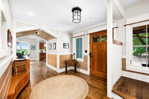 Main Level: Foyer features large windows to exterior