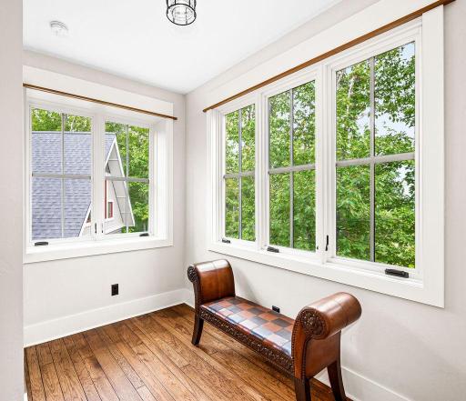 2nd Level: Sitting Area features large bank of Windows...