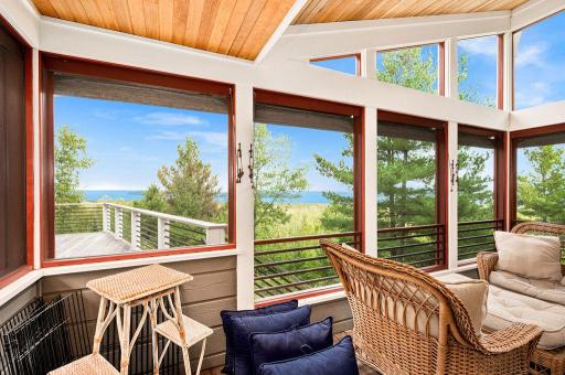 ...custom canvas exterior blinds to keep out rain and snow, steel beam construction to prevent swaying due to height of structure, large ground level Storage Room underneath Porch...