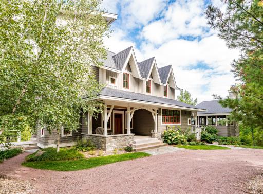 Unique and dramatic design created to take advantage of GREAT views with varying rooflines, large windows, thoughtful combination of materials and a functional, livable floor plan
