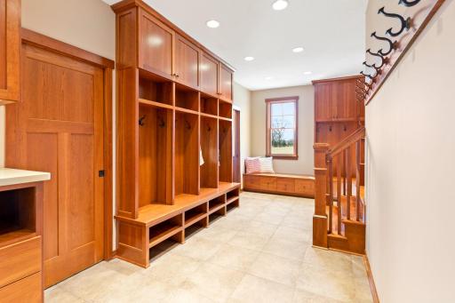 Mud room with custom lockers, drawers, hooks, cubbies, bench...so much storage!