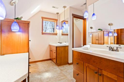 Jack & Jill full bathroom between BR 2 & 3 with separate sinks and private stool