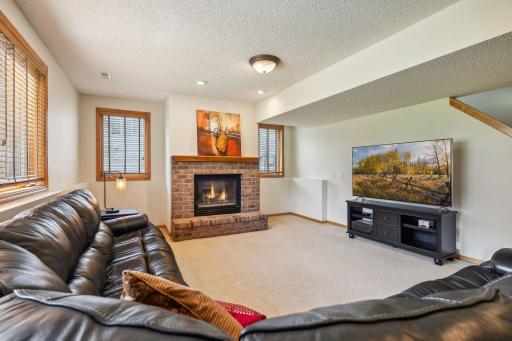 Lower level family room with gas fireplace