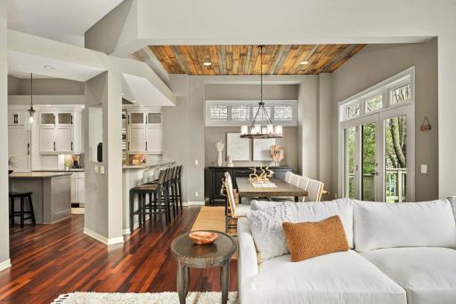 Formal dining separates kitchen and living room.