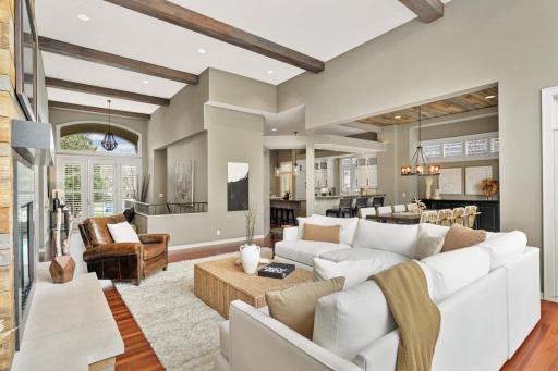 Living room is open to Dining and Kitchen
