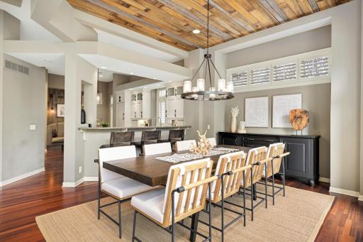 Raised seating across nearly 10' breakfast bar.