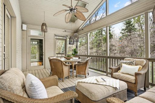 Unbeatable screened porch overlooking private setting and water feature!