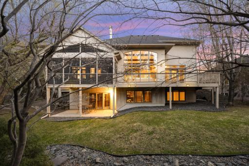 Five outside living and entertaining areas overlooking a private treed and boulder setting!