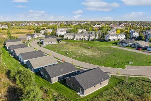 Welcome to Education Drive! Several homesites to build on or move-in ready 2 and 3 bedroom villas with 2 or 3 car garages! Quiet windy street with private, natured filled and surrounded with wetlands below.