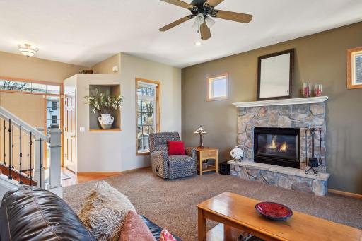 Beautiful designed w/ extra windows, stone fireplace. Neutral carpeting throughout.