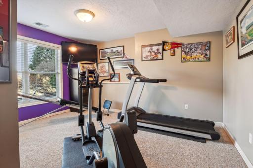 4 bedroom works great for workout room, office or additional bedroom. Large windows in the lower level also.
