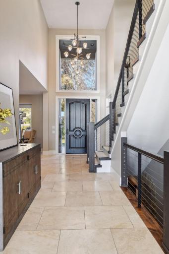 Step through the welcoming entrance to the home where every detail evokes warmth and hospitality.